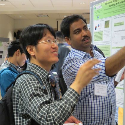 Joseph Cho and Purushotham Pallinti discuss research at poster session